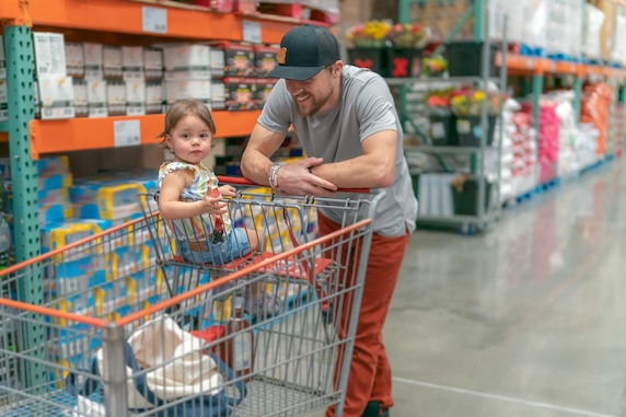 man and child at the store