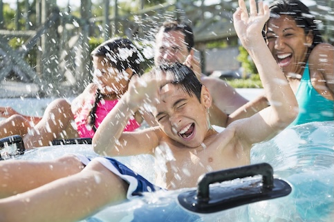 people smiling at a water park